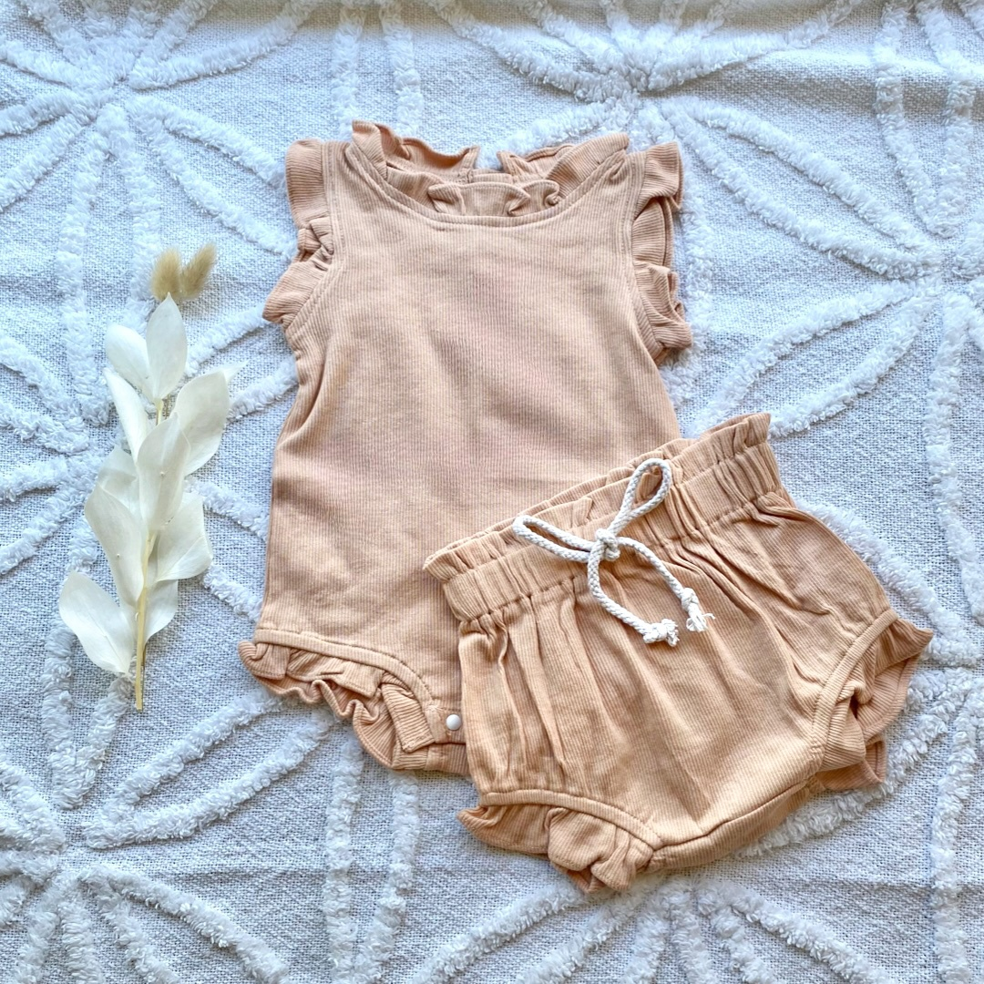 Frill Baby Ribbed Romper Front Image. Baby Girl Clothing