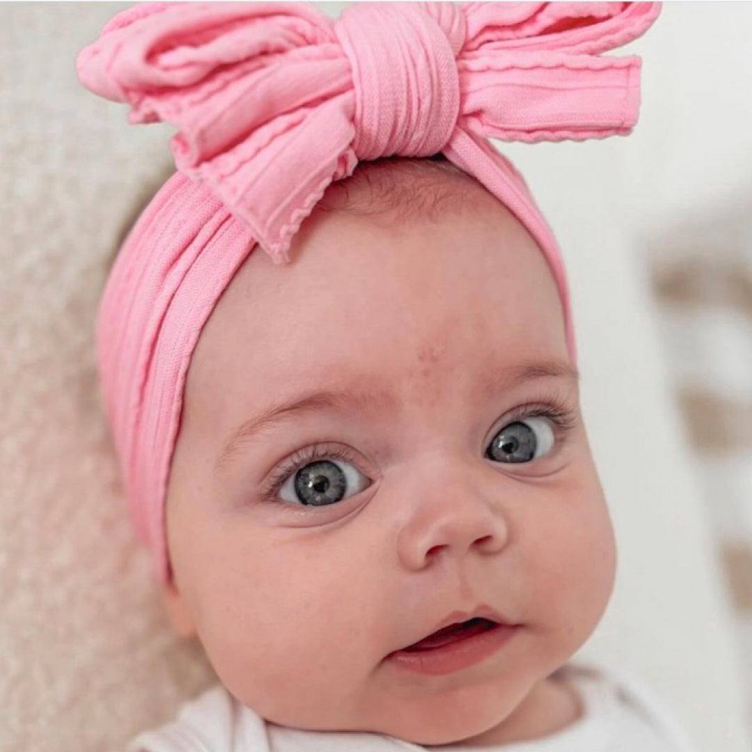Large candy pink cable knit baby bow headband