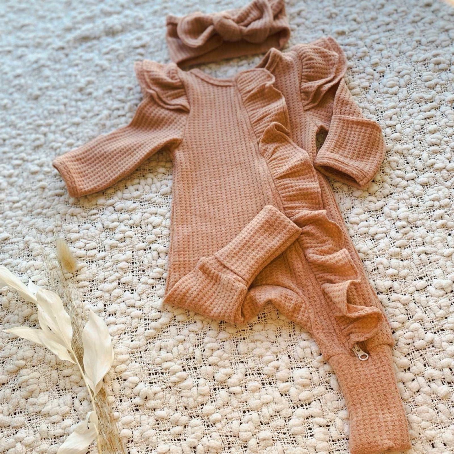 Newborn baby frill onesie. Baby girl romper