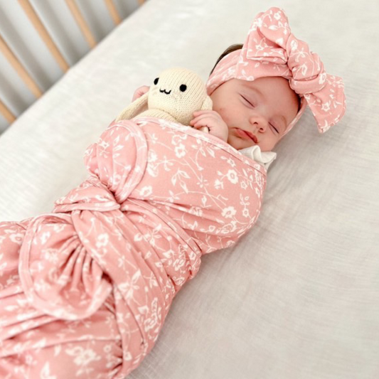Pink posies jersey swaddle and bow set