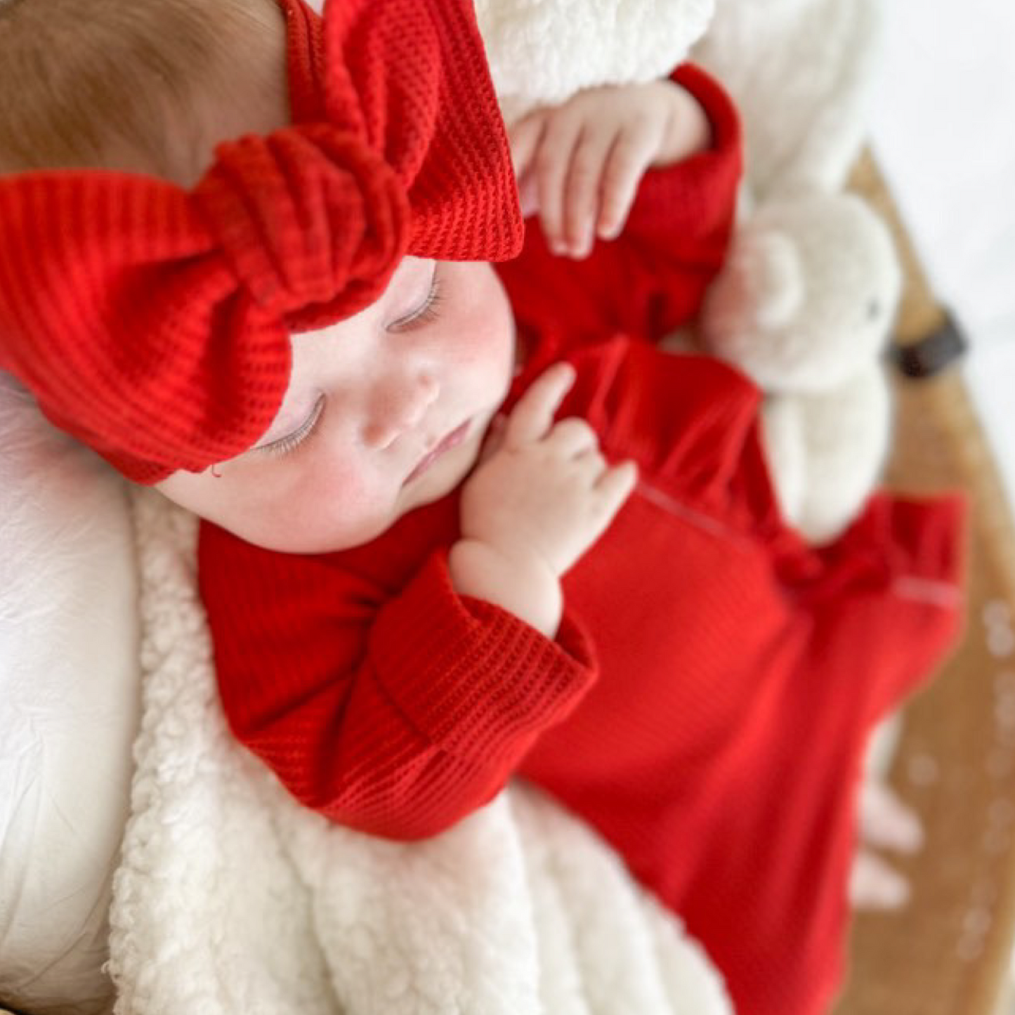 Red waffle frill romper and bow. Zip onesie. Newborn baby girl onesie
