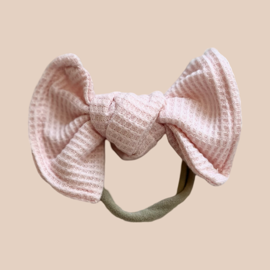 Baby pink petite waffle baby bow. Newborn baby headband