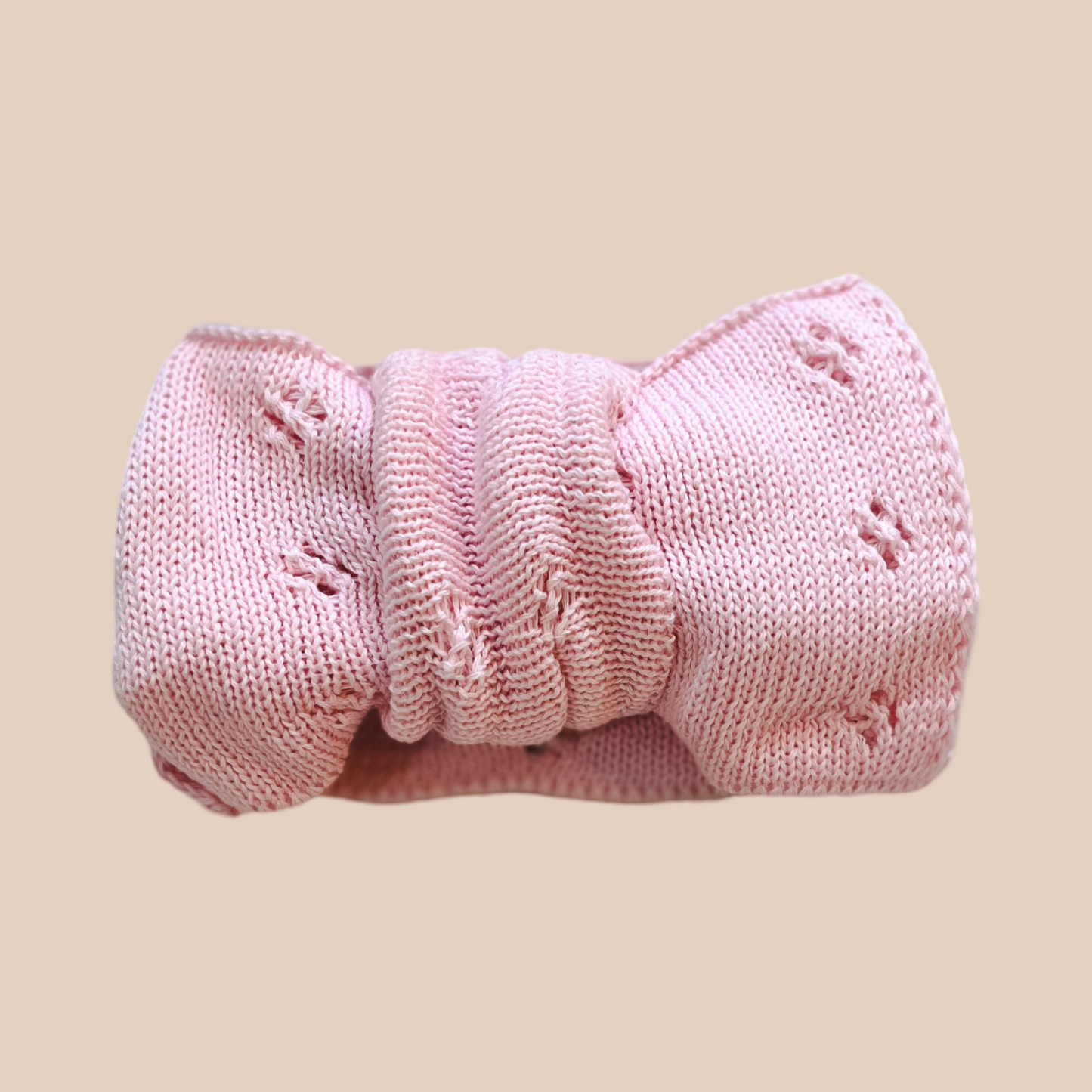 Pink oversized knit baby bow. Large baby knit bow. Pointelle knit baby bow