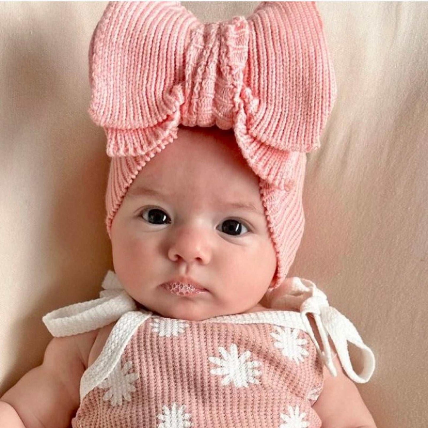 Large pink knit baby bow. Newborn baby headband