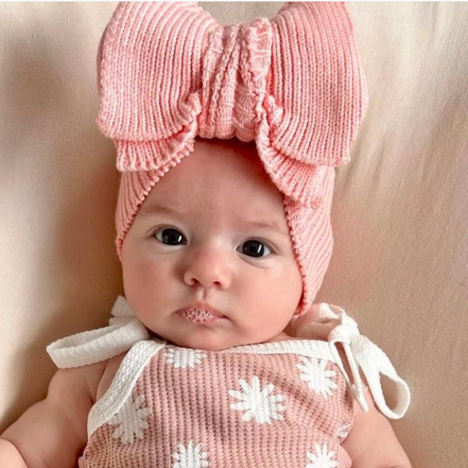 Large pink knit baby bow. Newborn baby headband