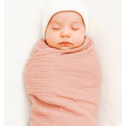 Pink newborn muslin wrap.