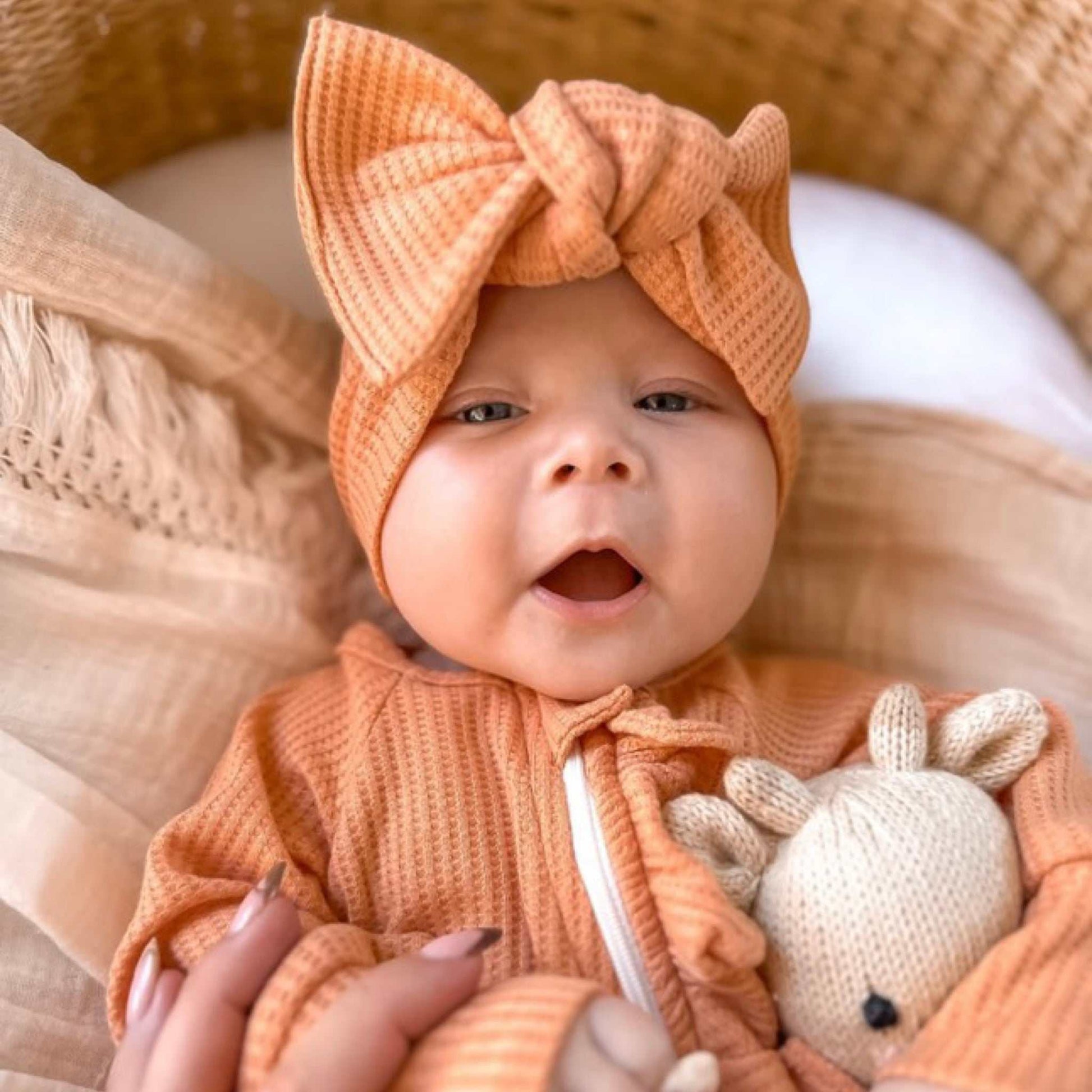 Baby onesie and bow set