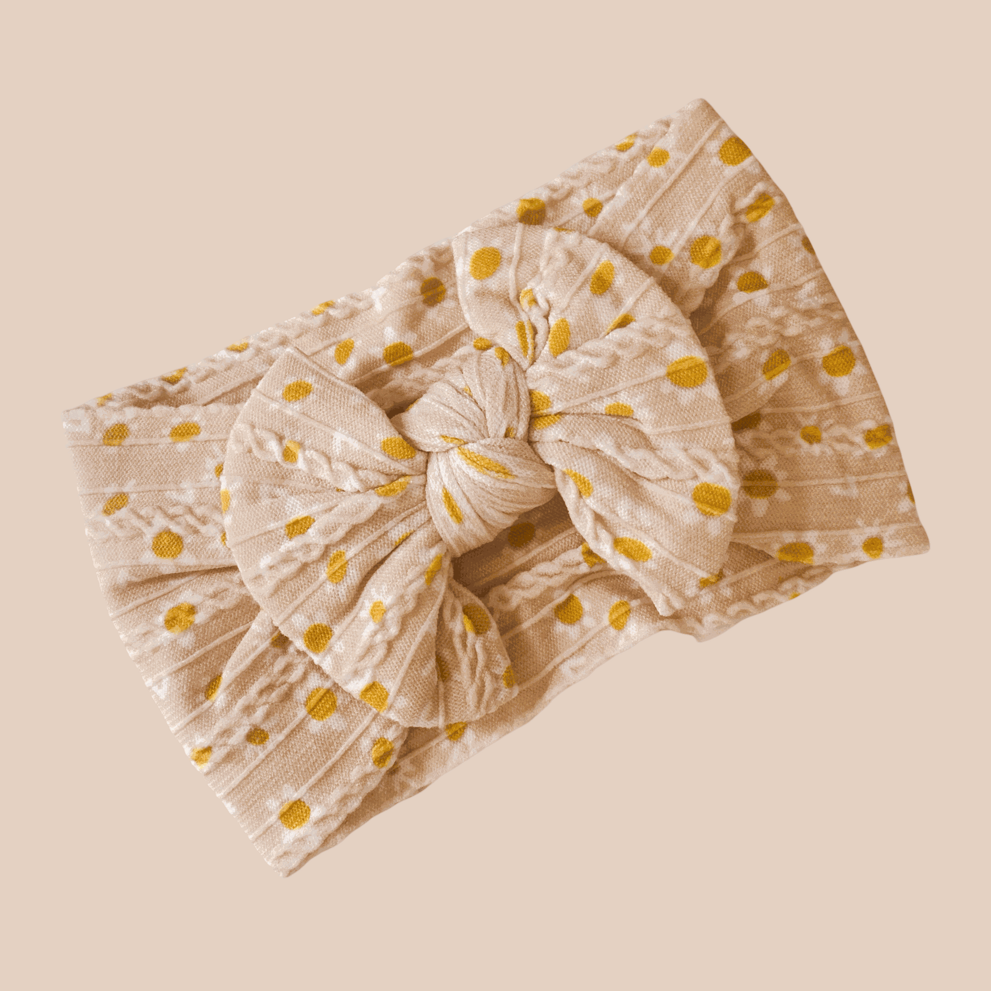 Peach Daisy cable knit baby bow headband. Newborn baby bow. Baby hair accessories