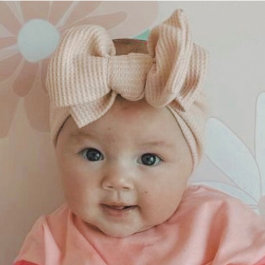 Nude waffle baby bow headband. Large baby bow