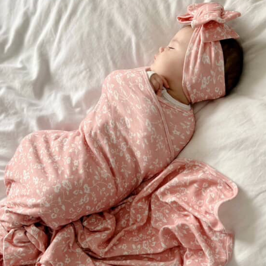 Pink posies jersey swaddle and bow set