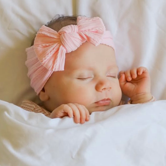 Cotton candy cable knit baby bow headband. Newborn baby bow