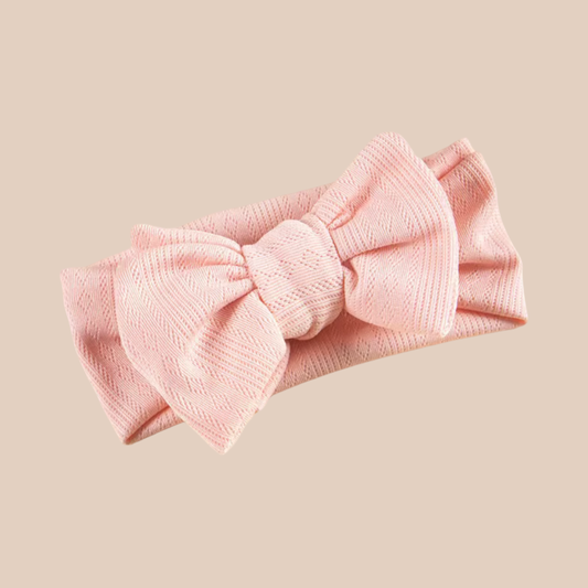 Pink baby bow headband. Newborn baby bow