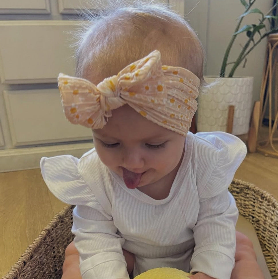 Peach Daisy cable knit headband