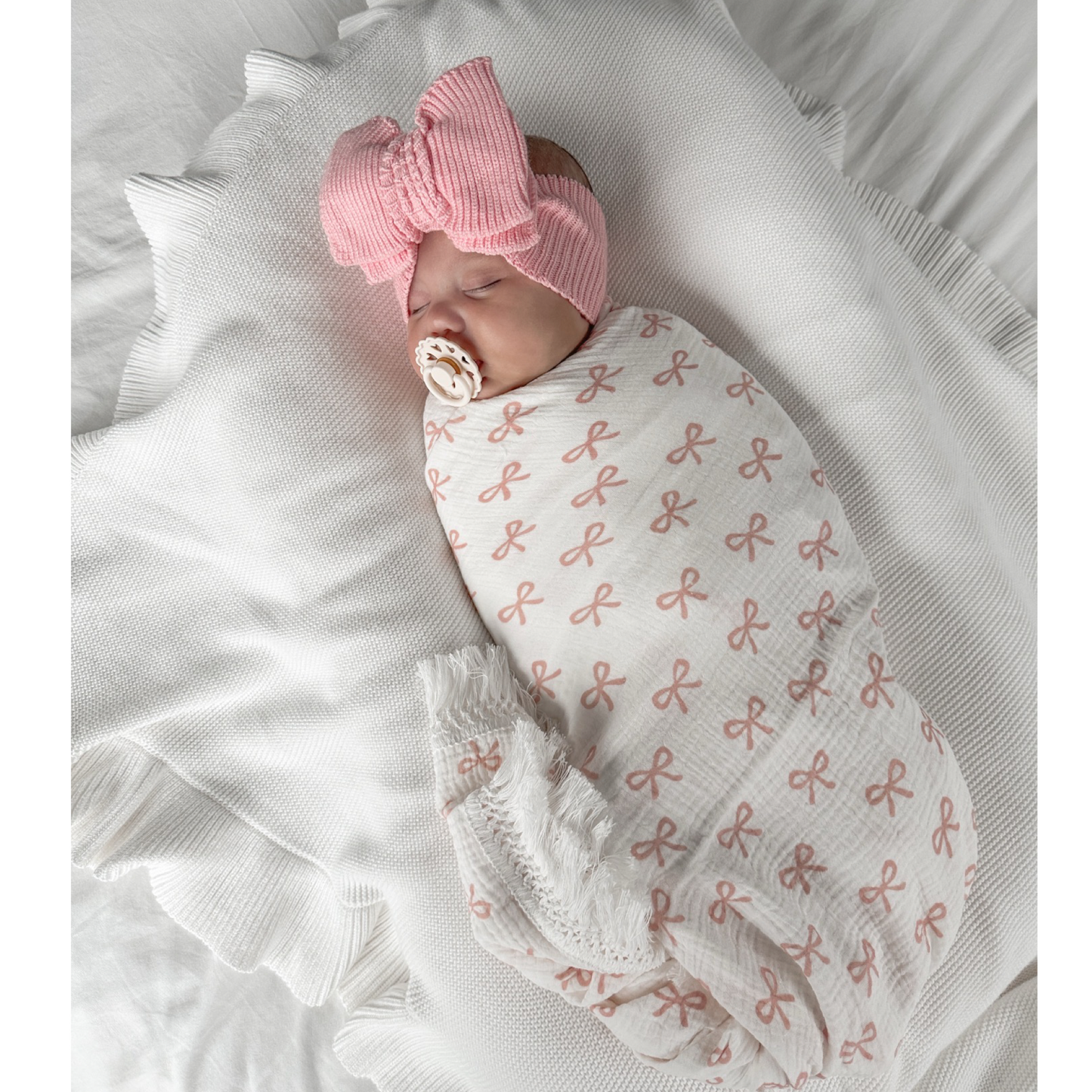 Pink bows fringe swaddle. Newborn muslin wrap