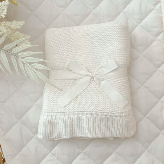 white frill knit baby blanket