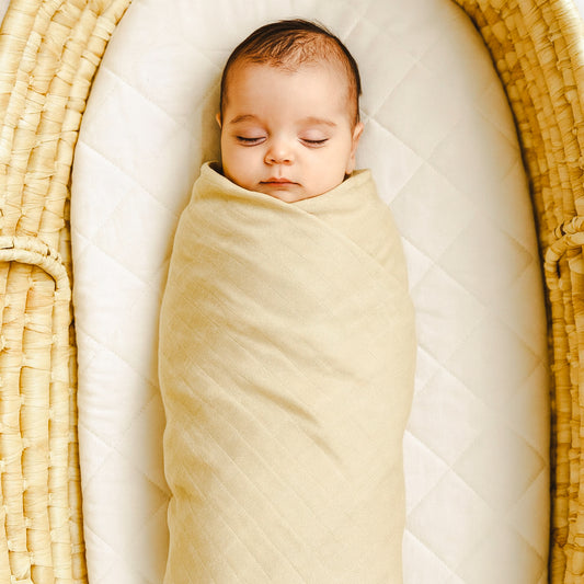 Beige muslin newborn wrap