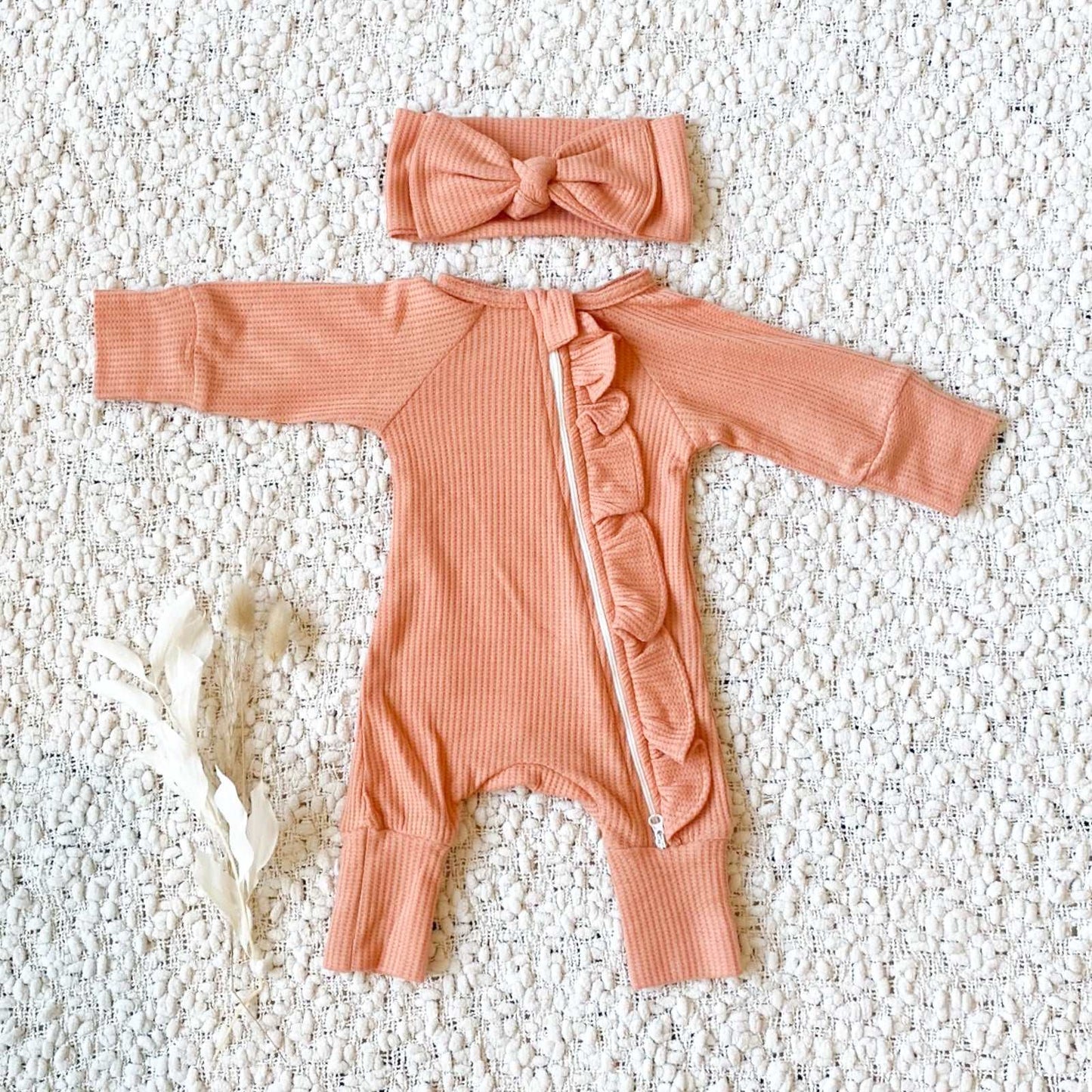 peach waffle frill baby romper. Romper and headband set. baby girl clothing