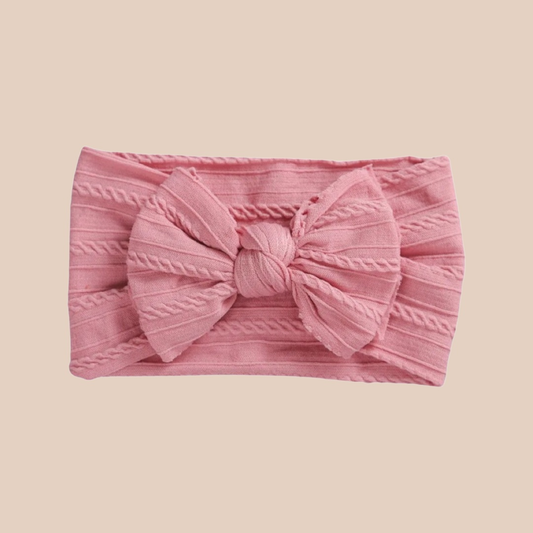 Pink baby bow headband.