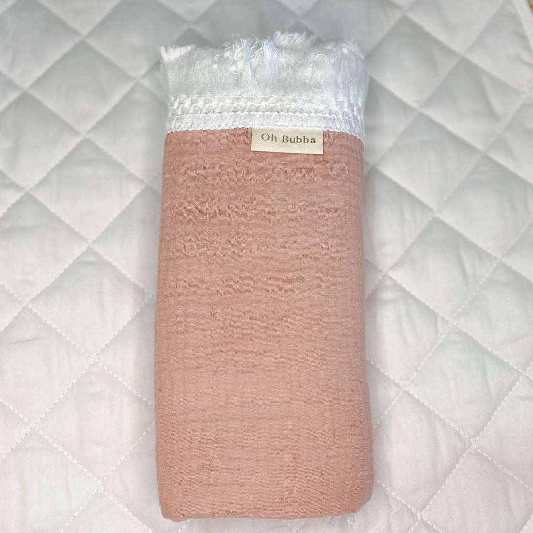 100 organic cotton baby fringe swaddle. Pink fringe swaddle. Baby swaddle. Baby muslin wrap. Newborn muslin wrap. newborn swaddle