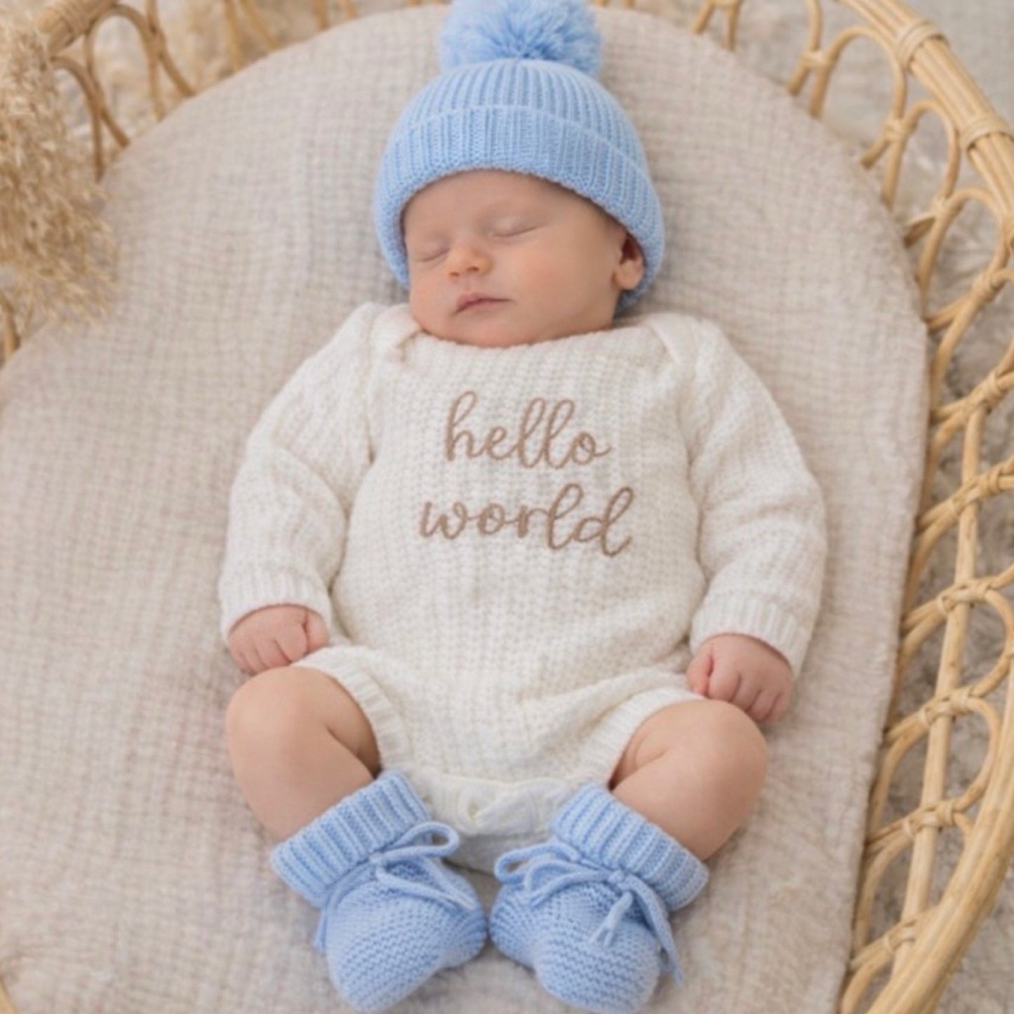 hello world knit announcement romper 
