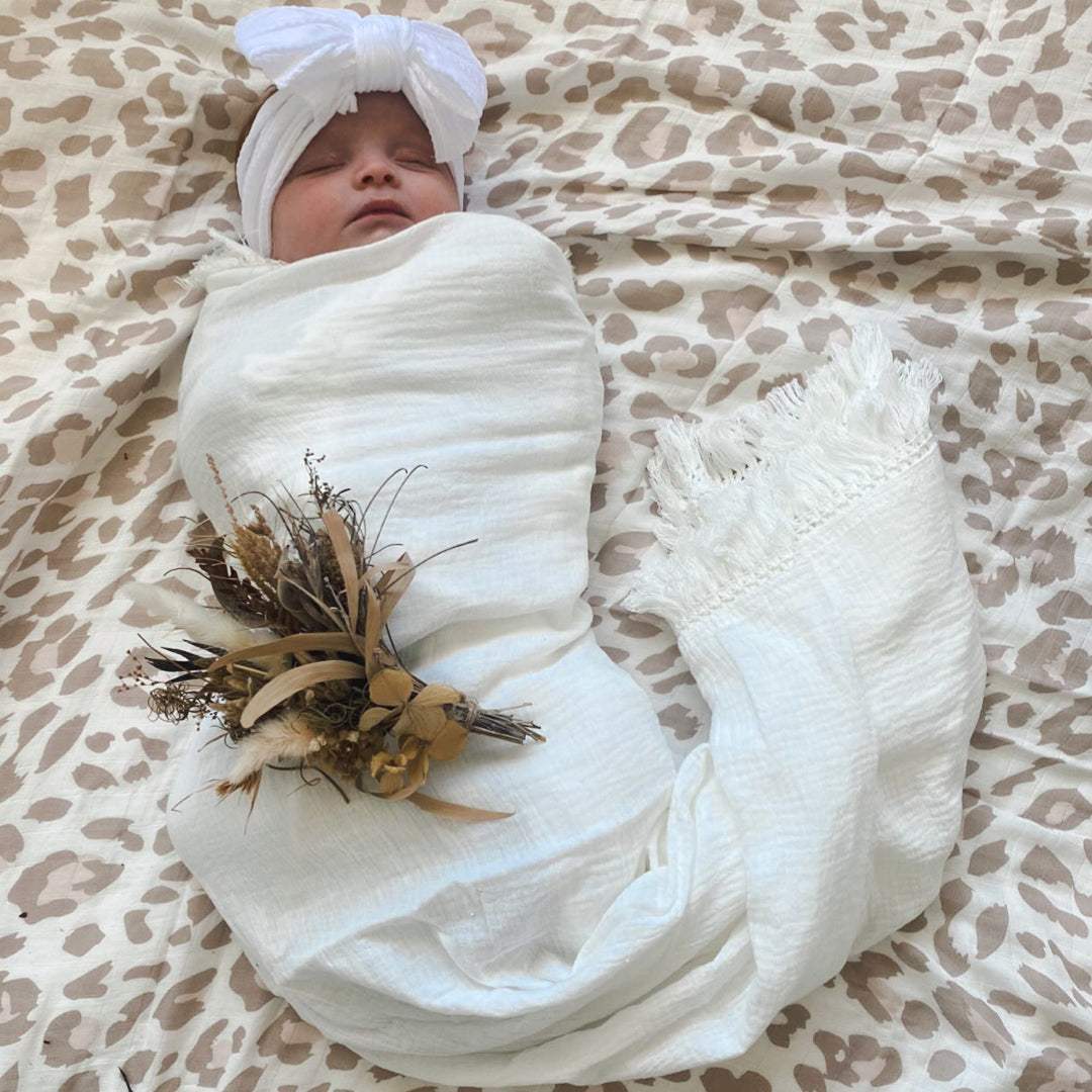 White baby fringe swaddle. Newborn baby wrap. Muslin wrap. Muslin swaddle. Boho baby. 