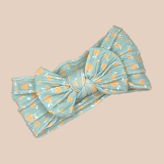 Polka dot baby bow cable knit headband. Newborn baby bow headband