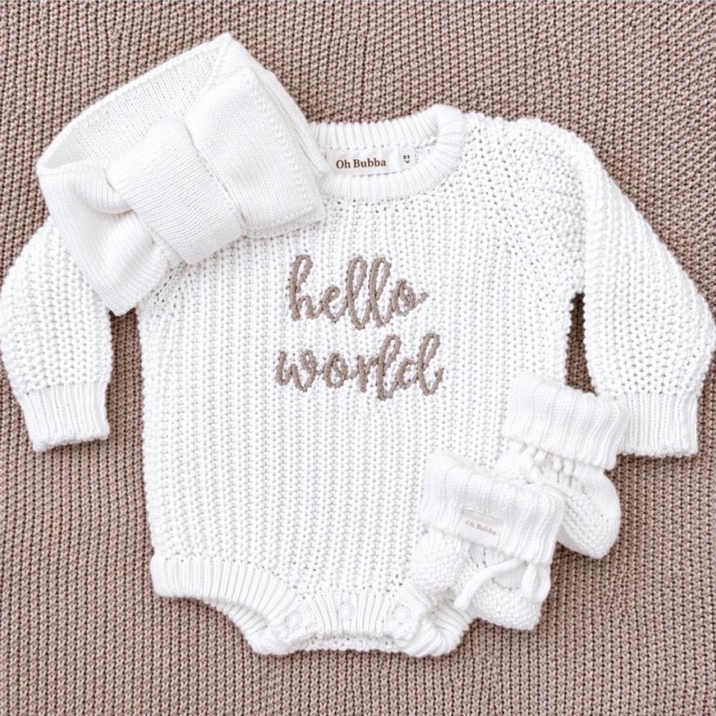 hello world knit announcement romper 