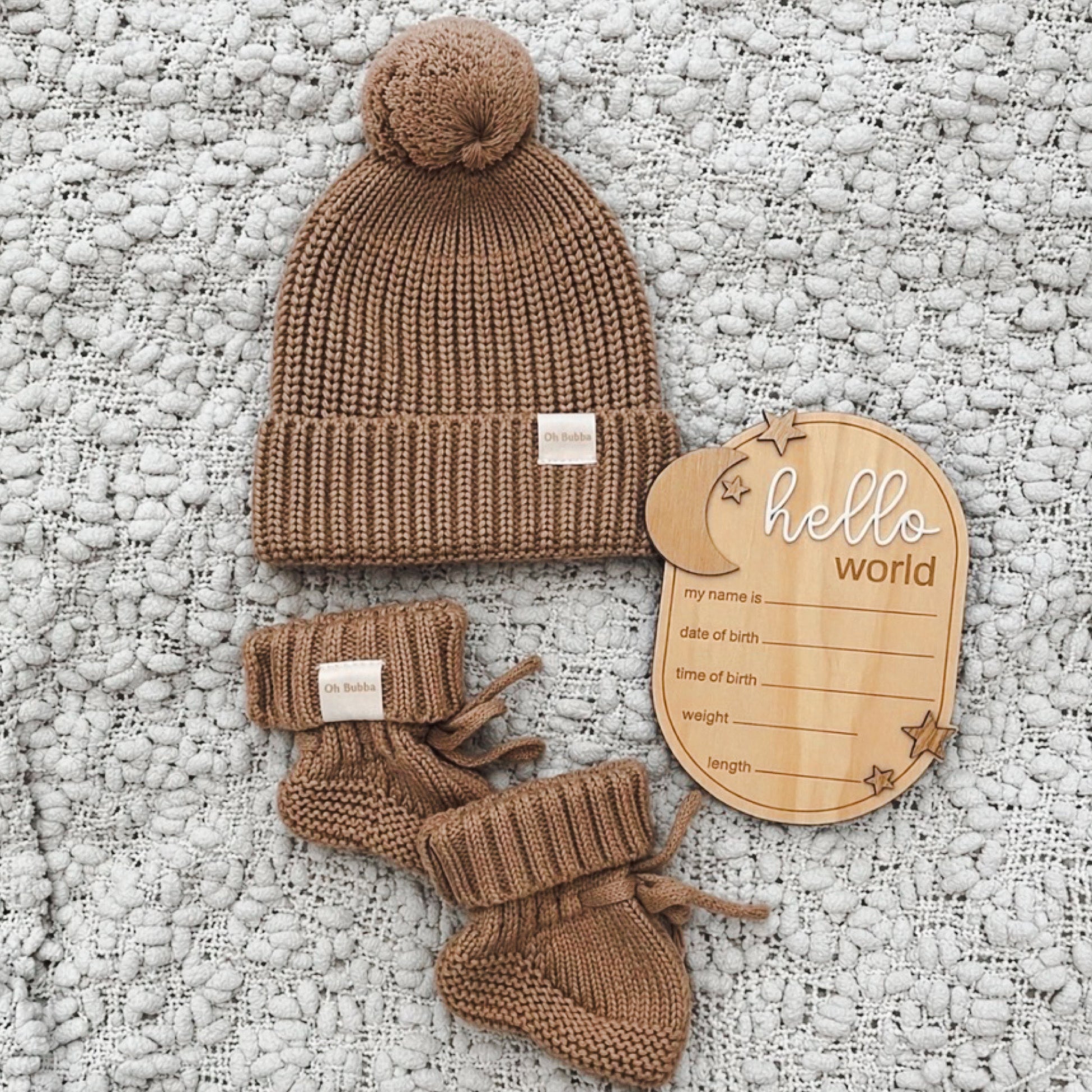 Chocolate knit beanie and Booties. Hello world announcement disc 
