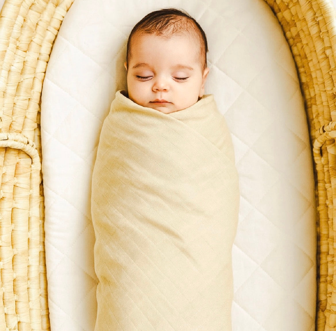 Biege muslin newborn swaddle. Baby wrap