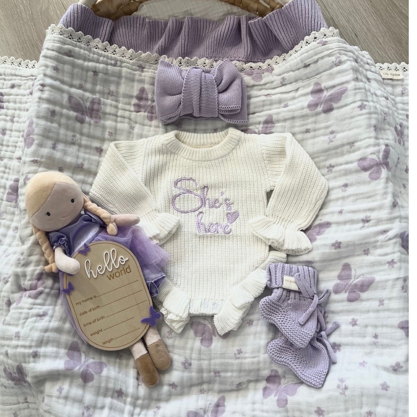 She's Here Frill Knit Announcement Romper | Lilac