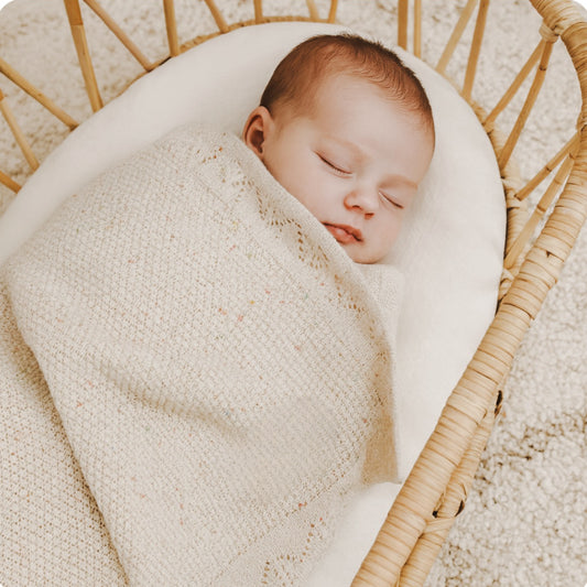 Speckled knit baby blanket 