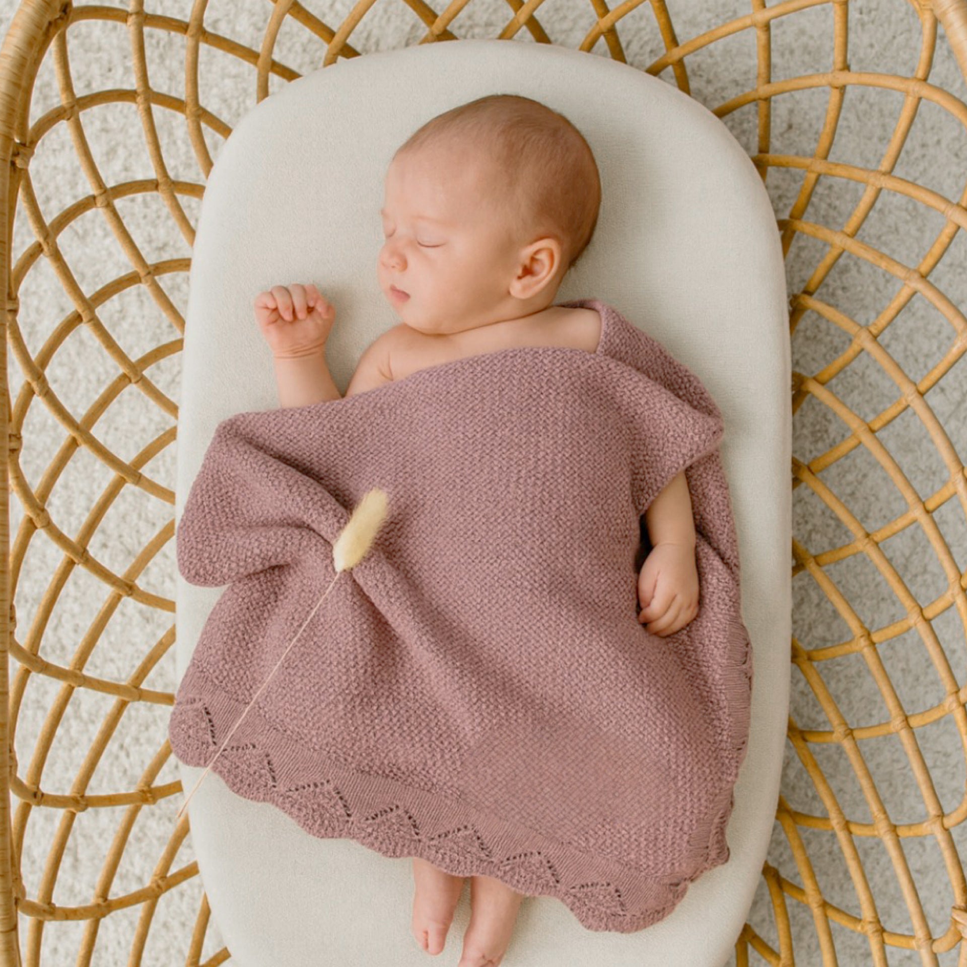 Mauve knit baby blanket 