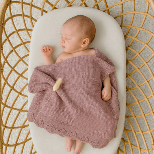 Mauve knit baby blanket 