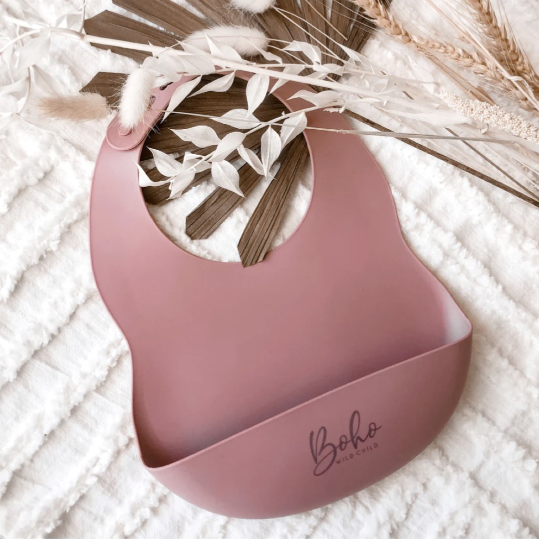 Baby silicone bib. Baby mealtime. Baby led weaning