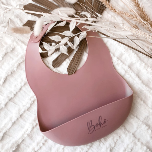 Baby silicone bib. Baby mealtime. Baby led weaning