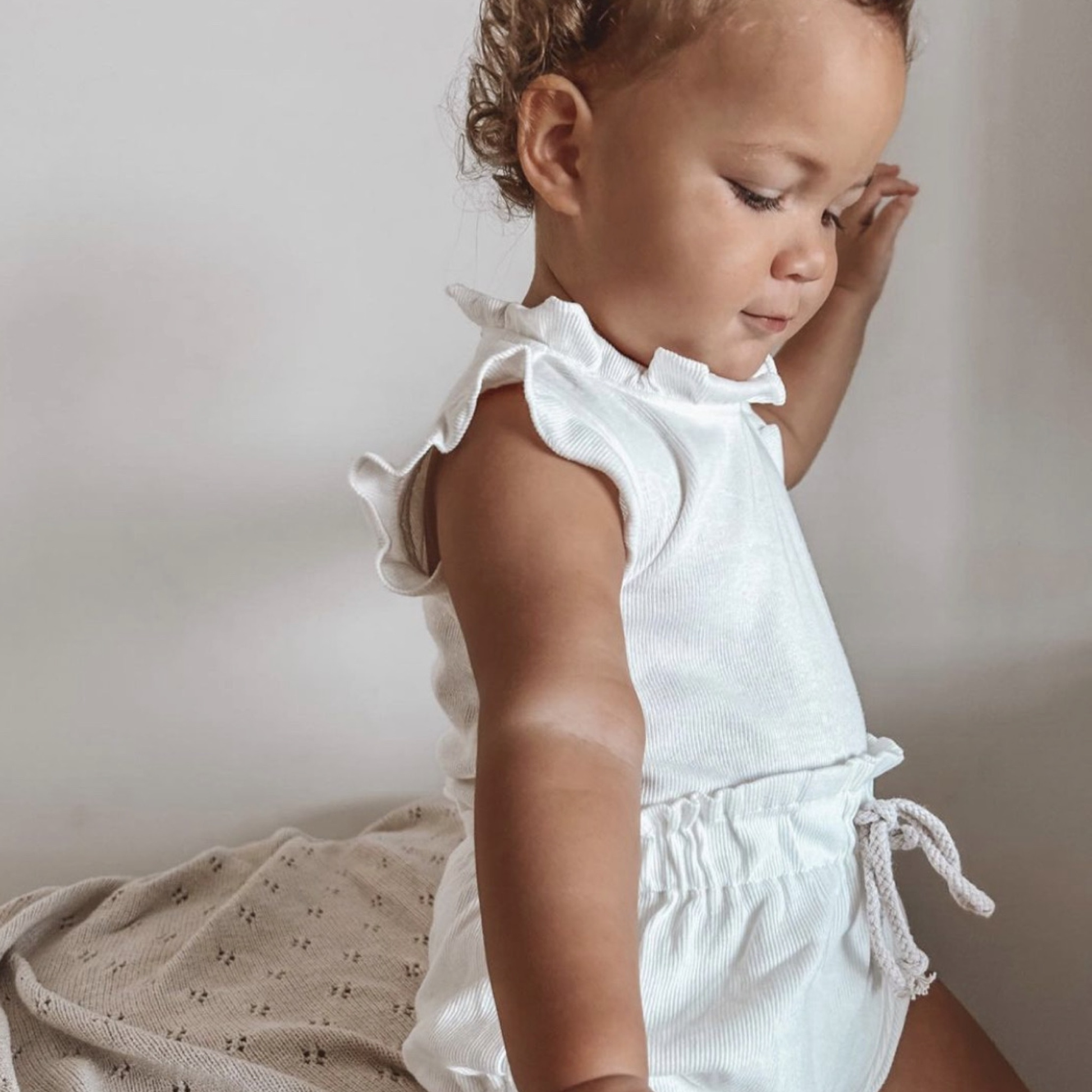 2 piece ribbed frill romper & shorts set. Frill Baby Romper Front Image. Baby girl clothing 