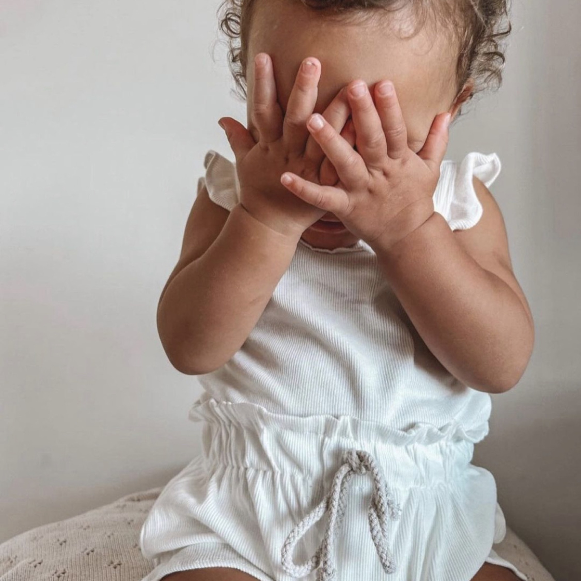 2 piece ribbed frill romper & shorts set. White baby frill romper and shorts set. Baby Romper and Bloomer Set. Baby girl clothing