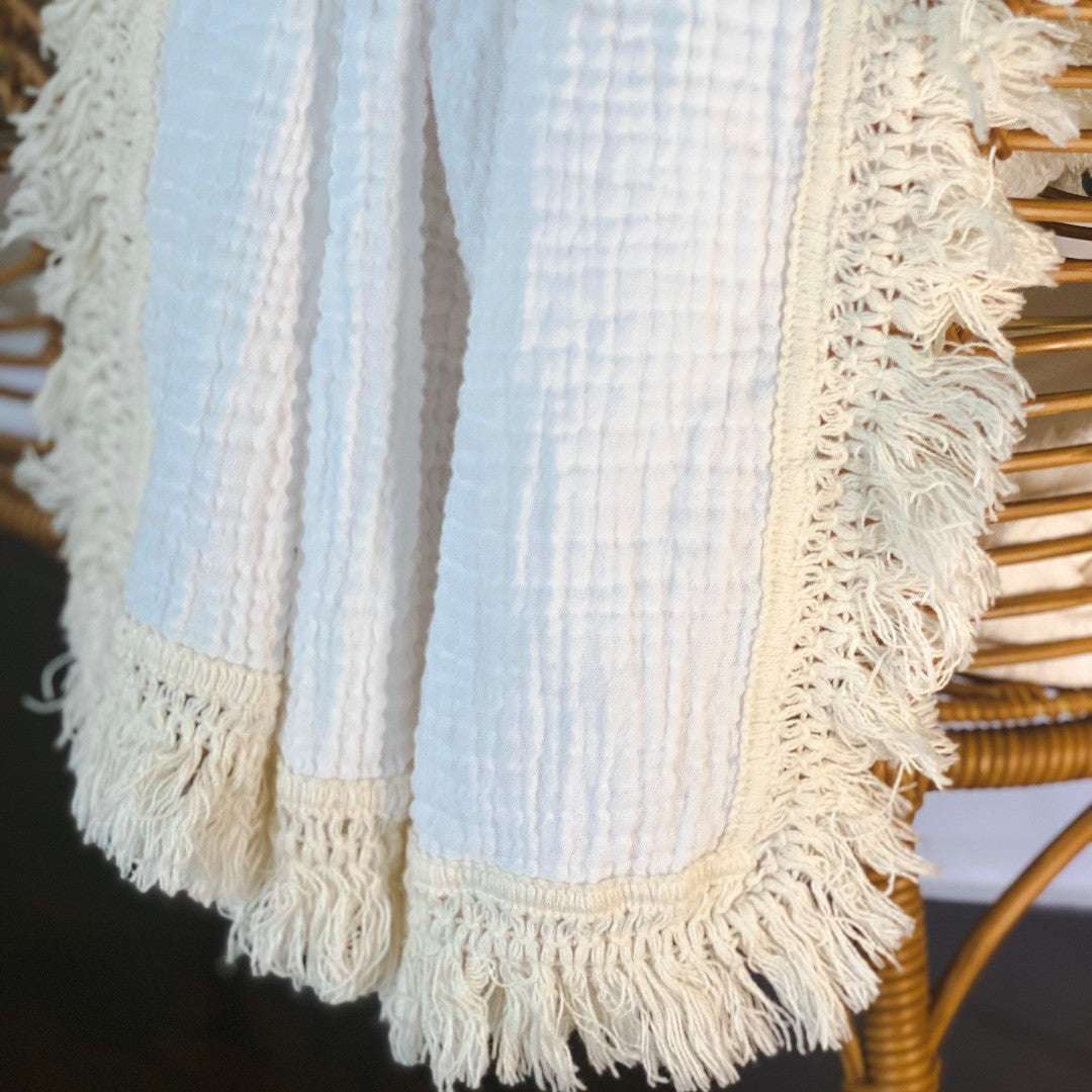 Boho baby fringe swaddle 